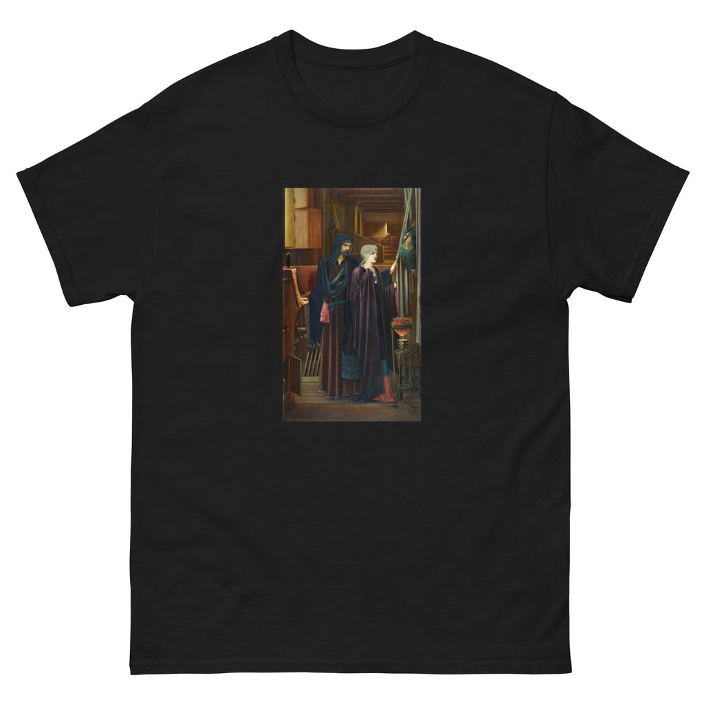 Black T-shirt The Wizard Two Figures In A Narrow Darkened Chamber A Bearded Man In A Heavy Robes Reveals A Convex Mirror To A Young Veiled Girl Behind A Drape Essential