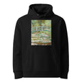 Black Hoodie Bridge Over A Pond Of Water Lilies Premium